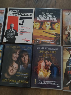 DVD pack of 8 including Hitchcock box set with 3 of 4 DVDs, like new