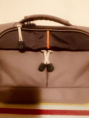 Delsey toiletry bag like new, gray with 2 compartments and shoulder strap