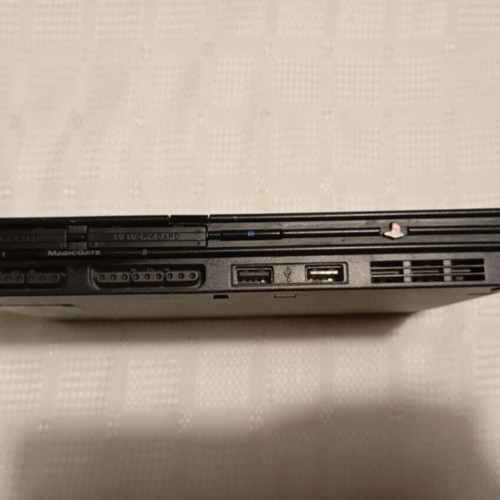 Sony PlayStation 2 Slim like new with cables and controllers