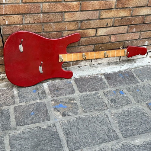 Wall hanger in electric guitar shape used, handmade with metal hooks