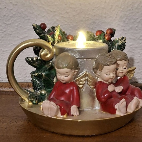 Christmas decorative angels with LED candle like new