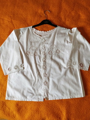Traditional white shirt with cutwork embroidery used