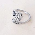 Silver 925 ring carved with butterfly design, like new, adjustable
