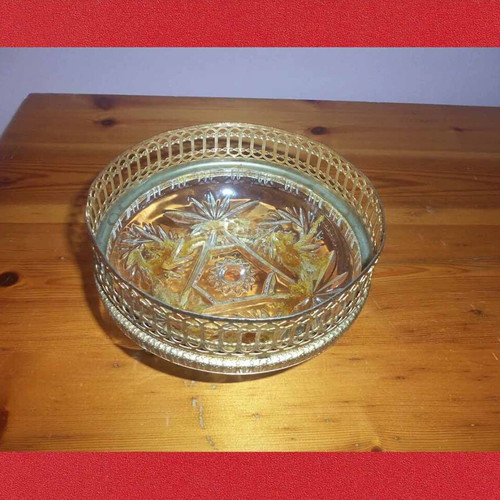 Tabletop metal fondue pot used with intricate decoration
