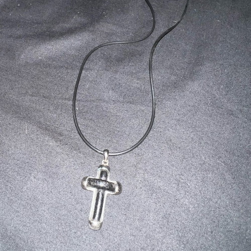 Silver cross with leather like new