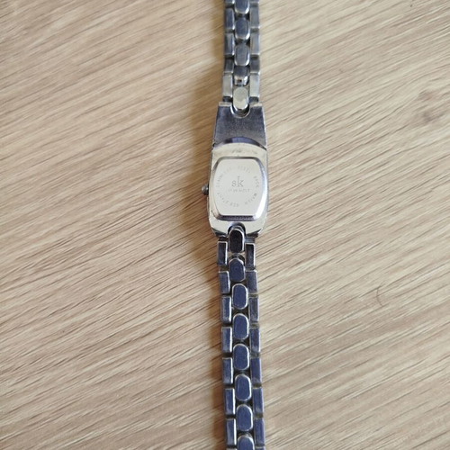SK women's watch used, silver and gold colors