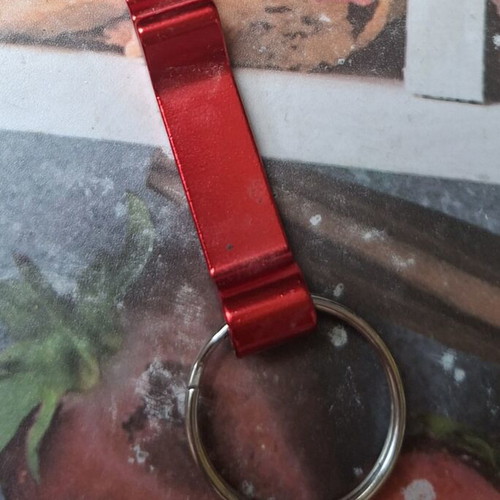 Collector metal keychain bottle opener like new, red