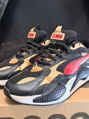 Puma RS-X3 CNY sneakers, black and gold, limited edition