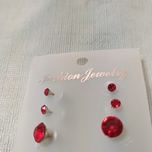 Pierced earrings set of three red, new, different sizes