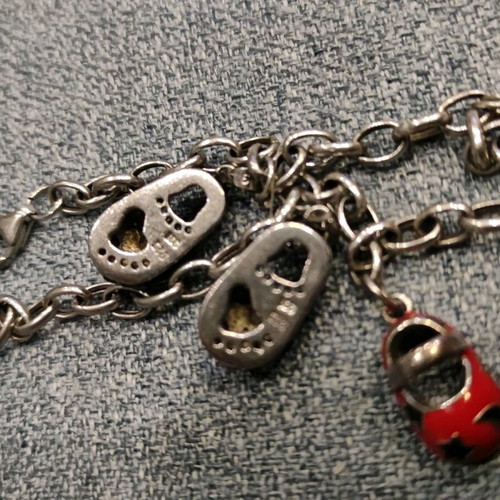 Silver 925 chain with 4 baby shoes used