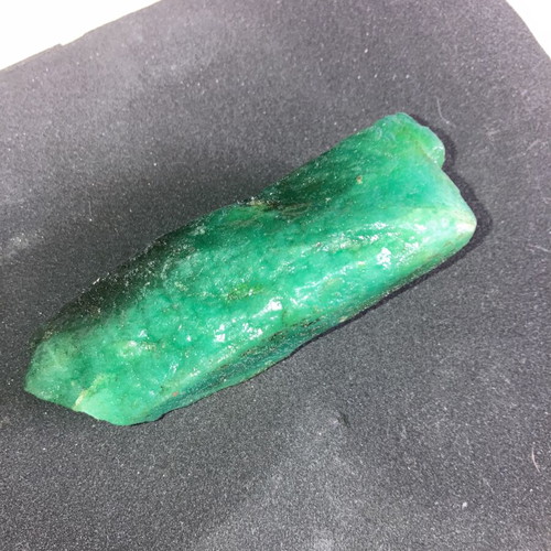 Uncut emerald 1129.00 carats with certificate