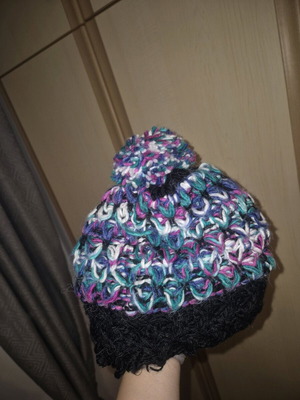 Handmade colorful knit hat used with minor damages
