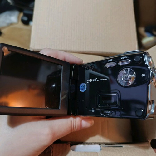 Mini camera like new with rotating screen