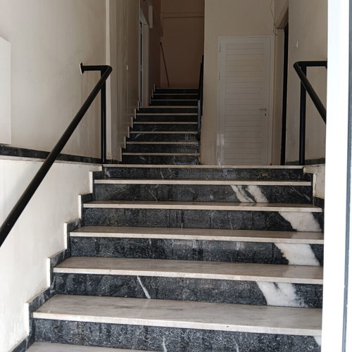 Multipurpose building with apartment and commercial space, Galatsi