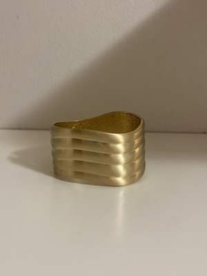 Gold bracelet with wave design like new