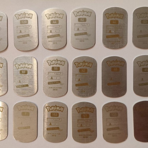 Pokemon caps 2016 set of 18 gold, like new