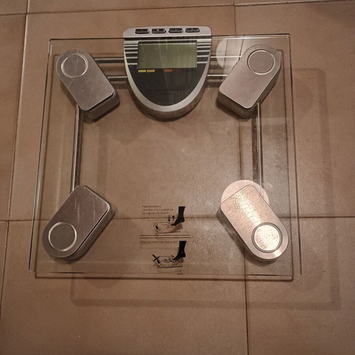 Electronic bathroom scale used, glass and metal