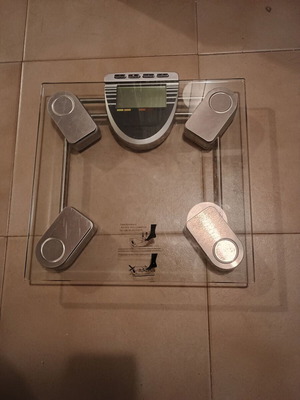 Electronic bathroom scale used, glass and metal