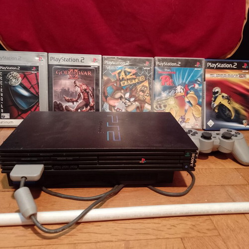 PlayStation 2 (PS2) used with 5 games pack and controller