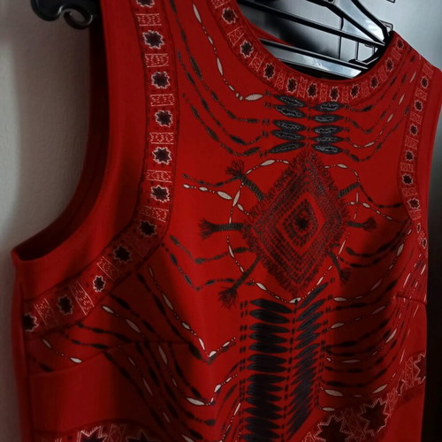 Red sleeveless top with ethnic geometric motifs, like new