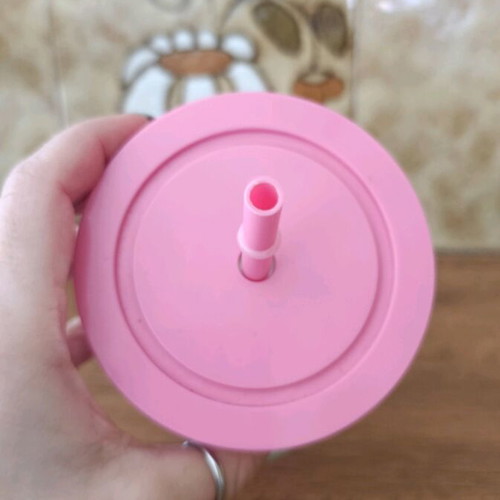 Plastic water bottle pink with designs and glitter, new