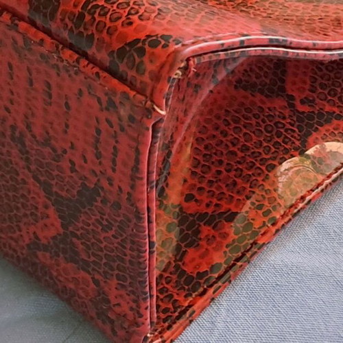 Vintage vinyl shoulder bag with red Python print, like new