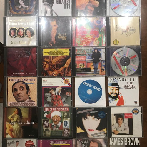 CDs of foreign music like new, 163 singles, doubles & triples