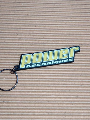 Μπρελόκ Power Magazine σαν καινούργιο, μαύρο και κίτρινο