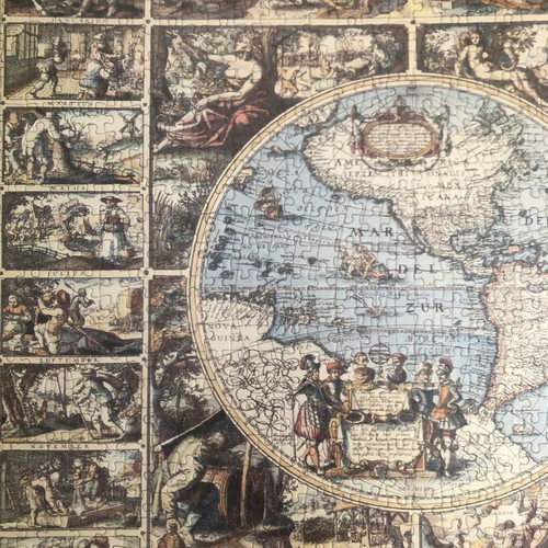 World puzzle with frame used, brown color and glass
