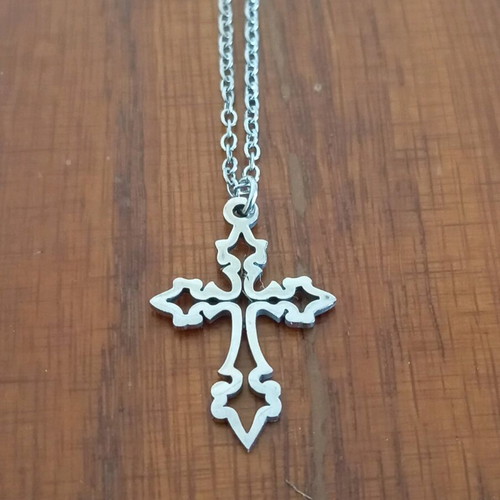 Steel cross like new, silver color