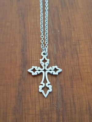 Steel cross like new, silver color