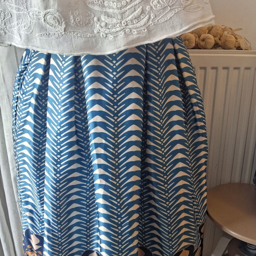 Satin skirt one size blue like new with elastic waist and pockets