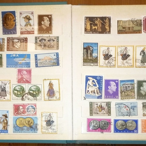 Book with collection of various Greek and foreign stamps used