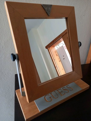 Guess tabletop mirror used, wood and metal