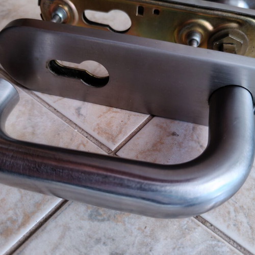 House door locks with handles and peephole