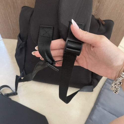 Baby bag with thermos holder and changing mat used