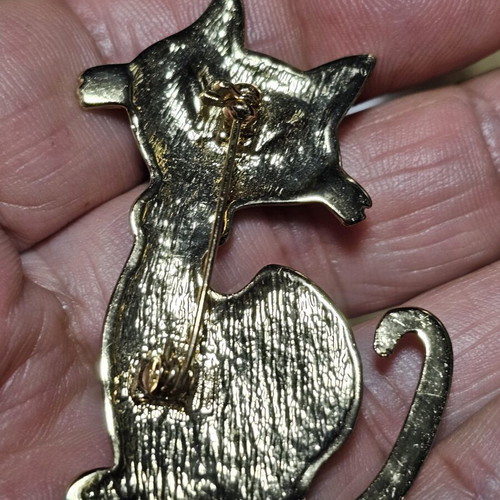 Cat brooch, black and gold