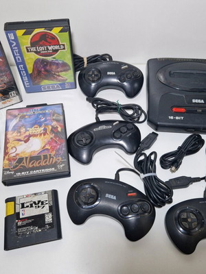 Sega Mega Drive console like new with 3 controllers and games