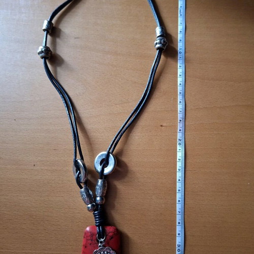 Women's necklace with red stone pendant and silver accessories like new