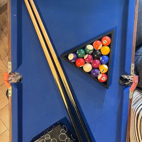 Billiard table used 90x50cm with balls, triangle, rest, and two cues