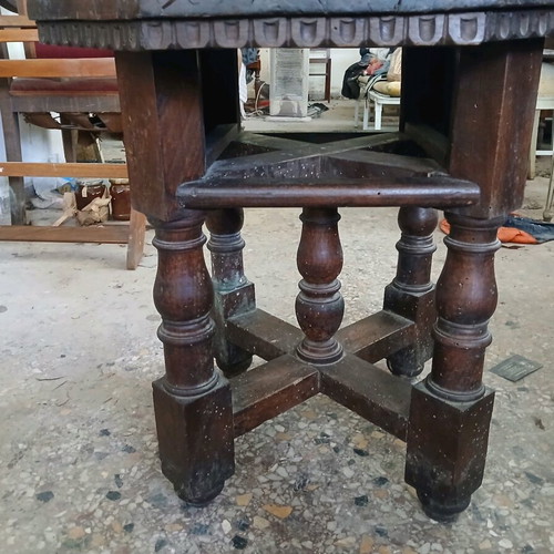 Vintage wooden table used, Victorian era with octagonal surface