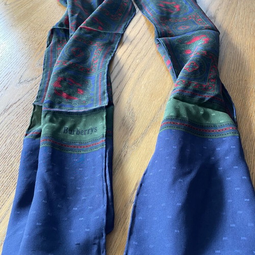 Burberry’s men's silk scarf new with beautiful patterns