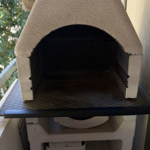Garden barbecue made of refractory concrete used