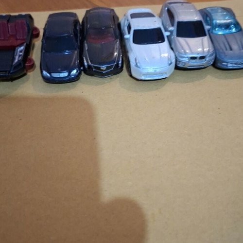 Set of black and white toy cars used