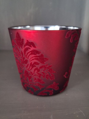 Glass candlestick like new with embossed velvet and silver glazing