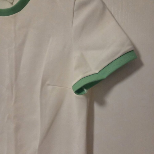 White blouse with green details, like new