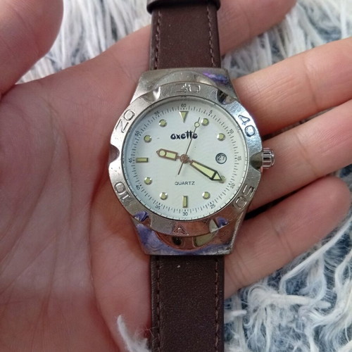 Oxette women's watch used with brown leather strap
