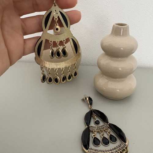 Dangling earrings used, large black and gold
