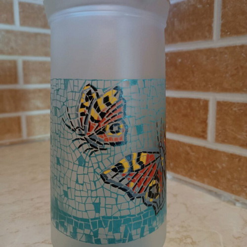 Glass pitcher with butterfly design like new