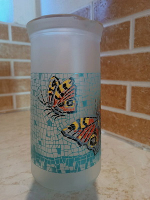 Glass pitcher with butterfly design like new